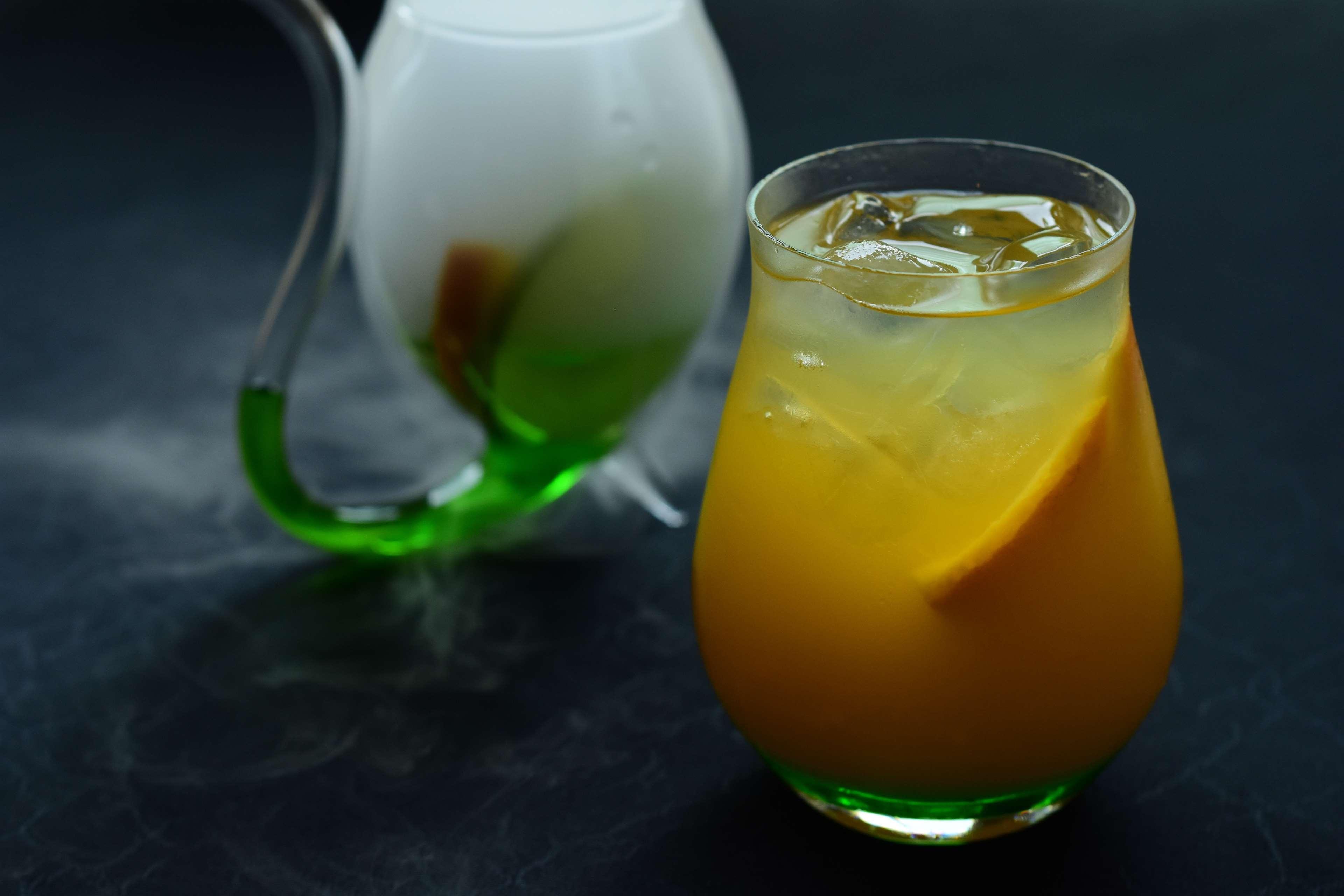 Hilton Mumbai International Airport Hotel Exterior foto A glass of orange juice